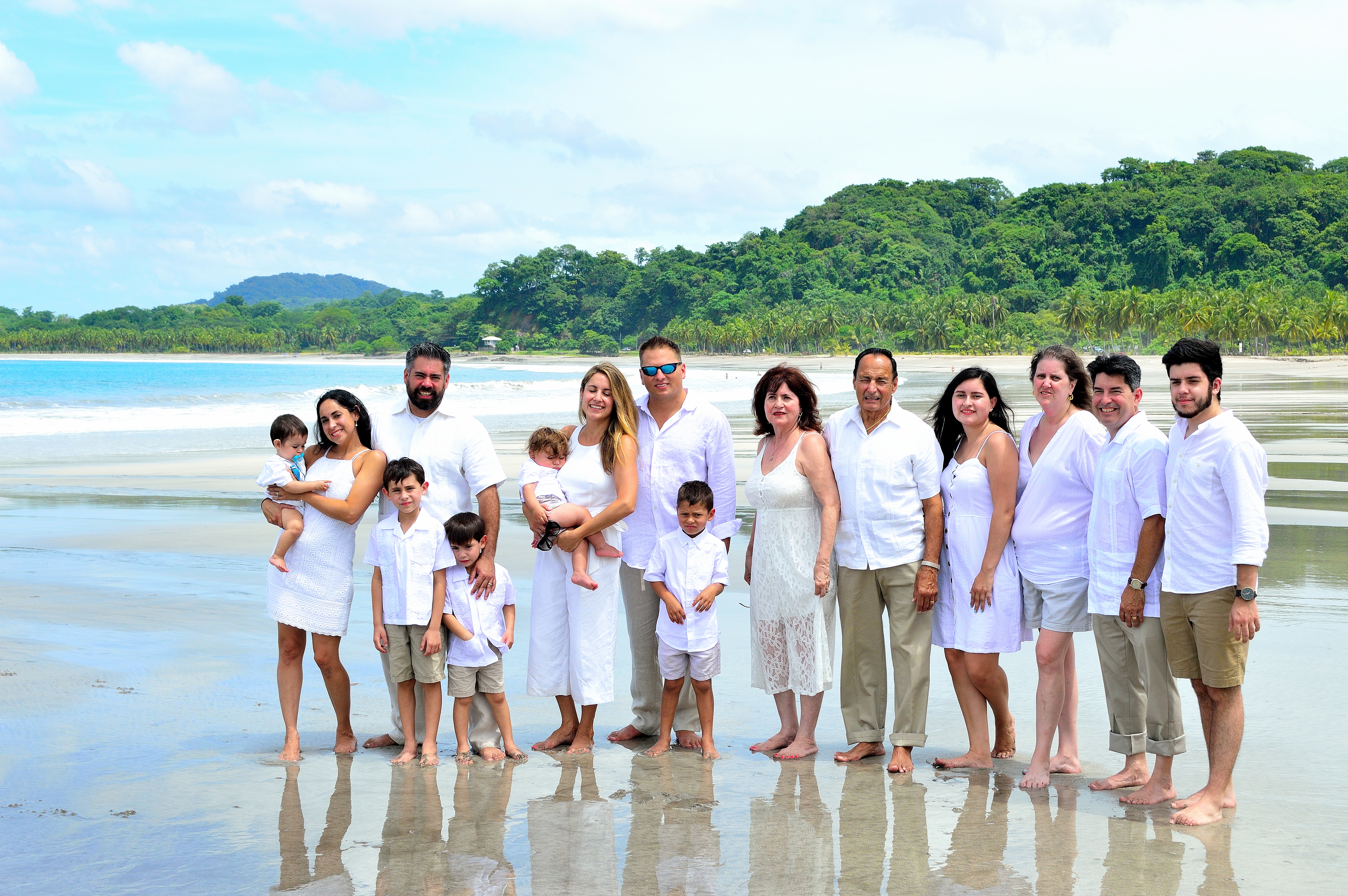 Relaxing beach day in Costa Rica with family palm trees